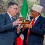 Israel’s foreign minister has met with Somaliland’s president during a historic visit to the breakaway region, marking the first official trip since Israel recognised Somaliland as an independent state last month. Gideon Saar held talks with President Abdirahman Mohamed Abdullahi, saying Israel was committed to advancing relations with Somaliland “with momentum.” Abdullahi described the visit as a “big day” for the region. Israel’s recognition of Somaliland was controversial, as Somalia considers Somaliland part of its sovereign territory and has strongly opposed the move. Somalia condemned Saar’s visit as “unacceptable interference” in its internal affairs. Posting on X, Saar said discussions covered the “entirety of our relations” and defended Israel’s decision to recognise Somaliland, stating it was not made “against anyone.” “Only Israel will determine for itself who it recognises,” Saar said. International Reaction Somaliland declared independence from Somalia in 1991 following the collapse of the government of former dictator Siad Barre, but until now had not been recognised by any country. Israel’s decision prompted international backlash, including criticism from China, Turkey, and the African Union, while the European Union reiterated its support for Somalia’s territorial integrity. The move also led to an emergency meeting of the UN Security Council. The United States defended Israel, accusing critics of applying double standards. Somaliland hopes Israel’s recognition will lead to broader international acceptance. However, India recently dismissed claims circulating online that it plans to recognise Somaliland, calling them false. Expanding Cooperation In a statement, President Abdullahi praised Israel’s recognition as a “courageous decision” and said Somaliland would cooperate with Israel in areas of strategic interest. Israel has pledged collaboration in agriculture, healthcare, technology, and economic development. Saar said Abdullahi had accepted an invitation from Israeli Prime Minister Benjamin Netanyahu to visit Israel, though Somaliland’s presidency has not confirmed this. Abdullahi has also said Somaliland would join the Abraham Accords, the 2020 U.S.-brokered agreements that normalised relations between Israel and several Arab states. Strategic Implications Analysts say Israel’s move reflects broader strategic interests in the Red Sea region, including security considerations. “Israel requires allies in the Red Sea region for many strategic reasons,” Israel’s Institute for National Security Studies said in a recent analysis, citing potential future conflict scenarios involving Iran-backed Houthi forces in Yemen. Israel’s recognition of Somaliland marks a significant geopolitical shift, with long-term implications for regional diplomacy and international recognition efforts.